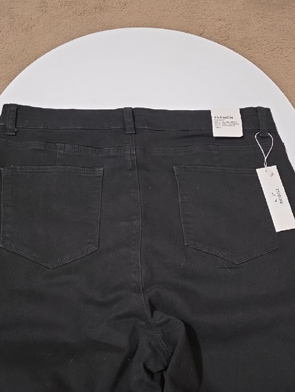 High-Rise Black Flare Jeans with Side Button Detail - Picture 7 of 9
